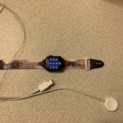 Apple Watch Series SE And Charger 