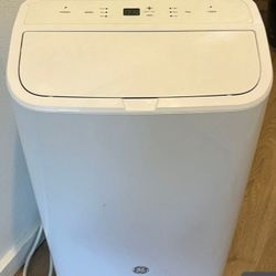 GE Portable AC WITH WHEELS AND PLUG WORKS EXCELLENT