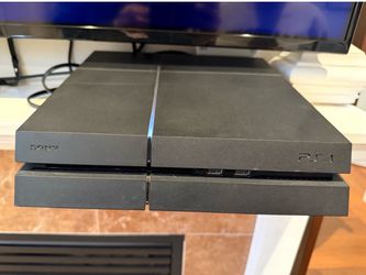 PLAYSTATION 4 WITH 4 GAMES