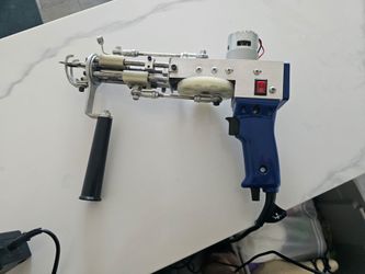 Tuft Gun with cloth and yarn included