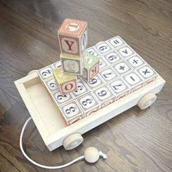 Uncle Goose Wooden Alphabet, Number & Math Blocks Pull Cart Toy Set