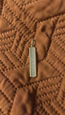 Gold bonded pendant