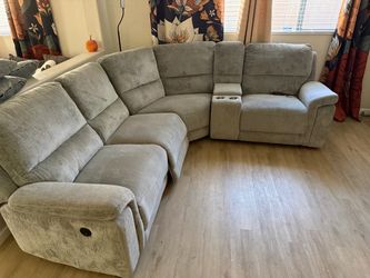 Reclining grey sofa couch