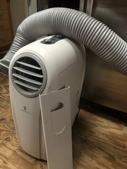 Portable Friedrich Dehumidifier 115V (A/C & Heat) including hose and window installment.