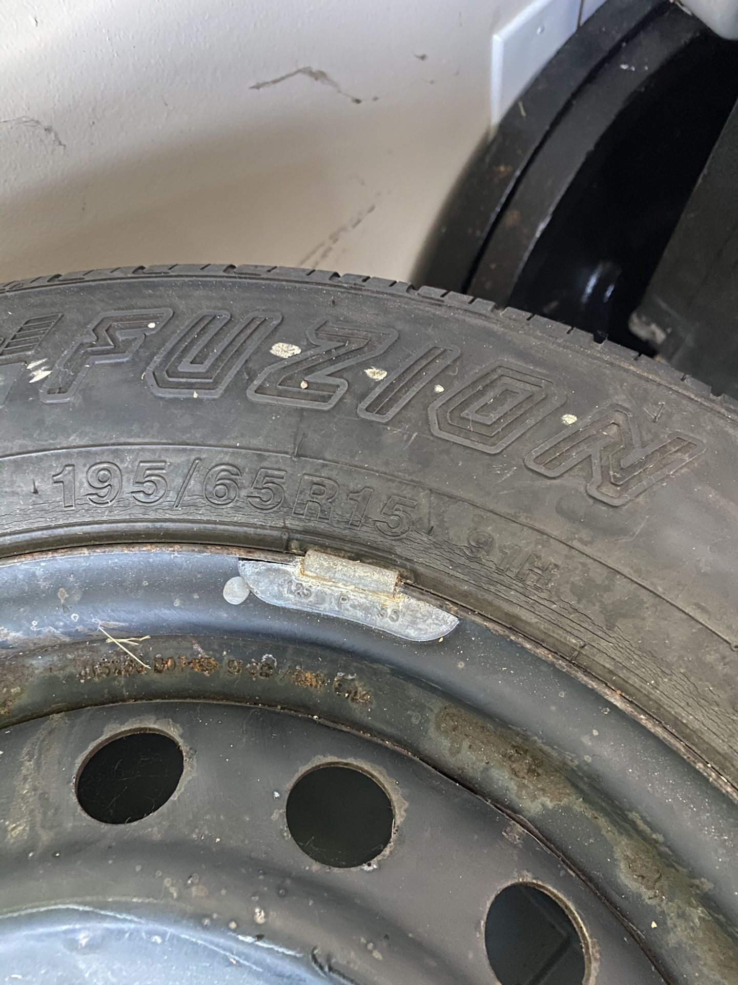 Two 15inch steel rim for Toyota and tires Fair condition