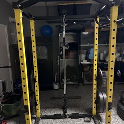 Squat Rack With Weights And Workout Equipment