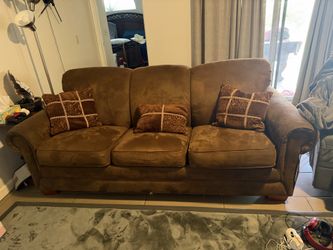 Free brown lazboy couch with pullout inflatable mattress