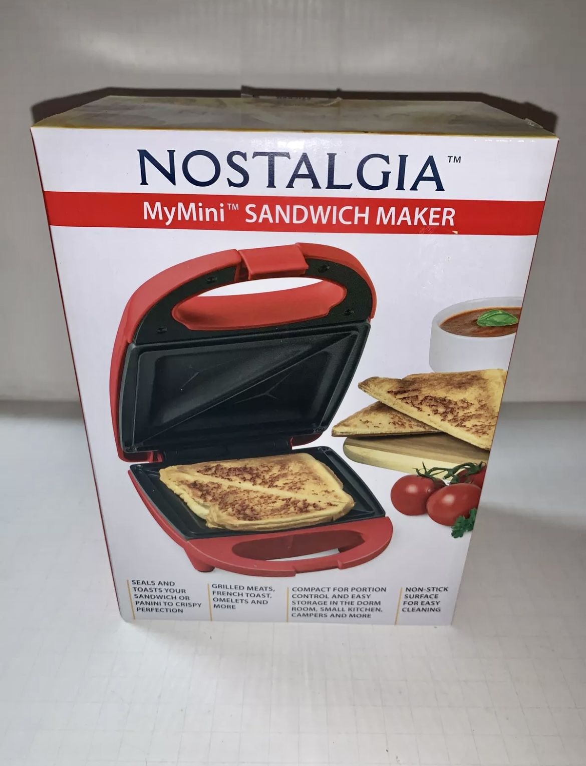 Nostalgia mini sandwich maker toaster compact for portion control seals and  toasts sandwich panini maker (RED)