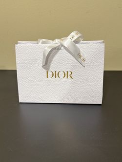 Dior white gift bag with ribbon