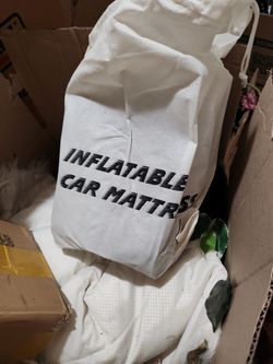 Inflatable car mattress with cigarette plug pump