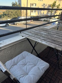 IKEA teak table + 3 folding chairs with cushions