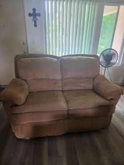 Tan two seat couch