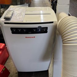 Honeywell - 450 Sq. Ft. Portable Air Conditioner with Remote and Window Kit Very Good Condition