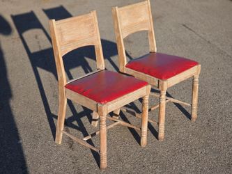 Two vintage chairs red vinyl