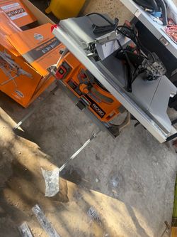 RIDGID 15 Amp 10 in. Portable Corded Jobsite Table Saw with Folding Stand