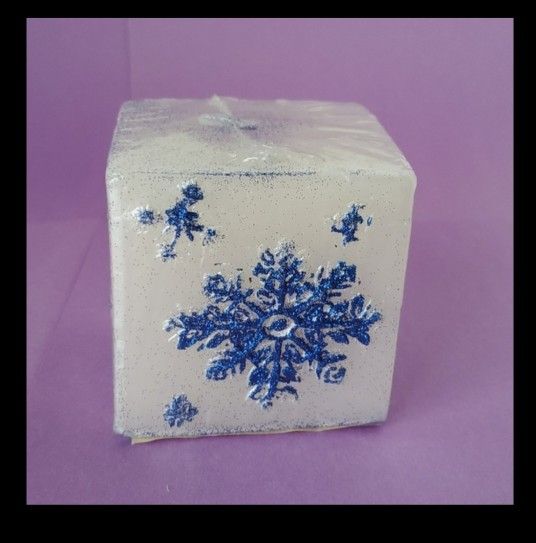 White Unscented Pillar Candle With Blue Glitter Snowflakes