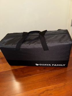 Guava family traveling crib