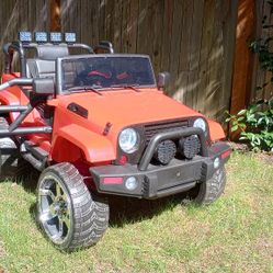 Upgraded Kids Ride-On vehicle Red Jeep