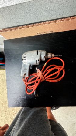 Old electric drills and sander