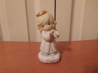 Precious Moments Figurine $5