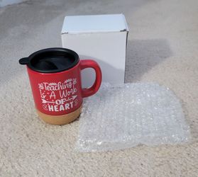 beautiful brand new mug with lid. (MUST SELL TODAY)
