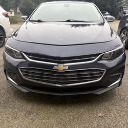 Chevy Malibu Lt sedan, blue exterior, and black interior