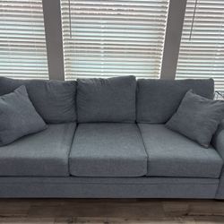 Living Spaces blue couch & loveseat 