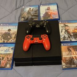 PS4 With Controllers And Games