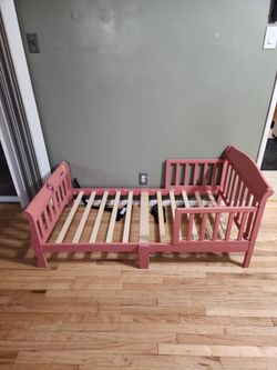 Pink toddler bed
