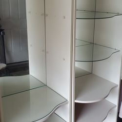 ENTERTAINMENT CENTER BEIGE BOUGHT AT HARLEM FURNITURE 