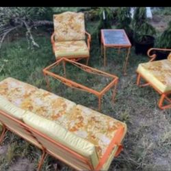 Vintage MCM metal patio set.  This set has been sandblasted and repainted.  2 tables, sofa and 2 chairs.