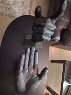 Two black hand sculptures very nice