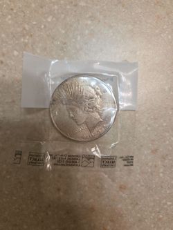 1928 s Peace Silver Dollar. Better Date