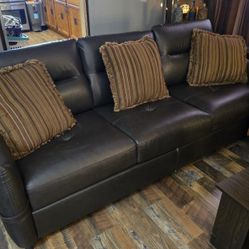 DARK BROWN FAUX LEATHER COUCH 