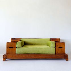 Brutalist vintage oak sofa with built-in drawers and green daybed