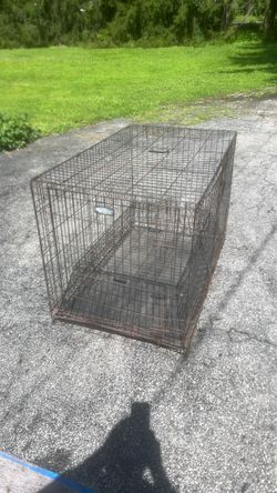 Large dog cage 48 in long by 30 wide by 33 high