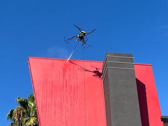 Pressure washing drone