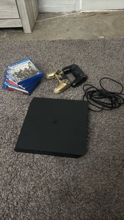 PS4 with two controllers and 6 games