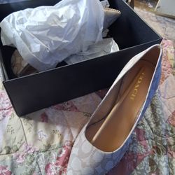 New Coach Heels