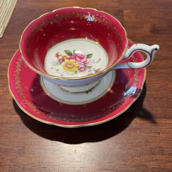 Teacup and saucer “by COALPORT “