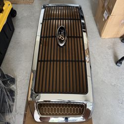Brand New in Box.  Chrome Grille with Black Inserts plus Black and Chrome Ford Emblem for Ford F250 F(contact info removed) to 2007