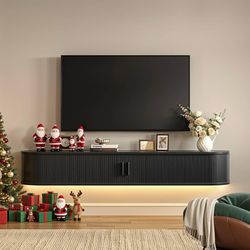 63" Floating TV Stand with Power Outlet for TVs up to 75", Fluted Entertainment Center with Remote Control for LED Lights, Mid-Century Modern TV Conso