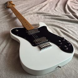 Squier vintage modified Telecaster Deluxe guitar white.