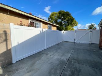 White Vinyl Privacy Fence with Gate