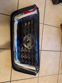 Nissan Front Grille with Chrome Trim