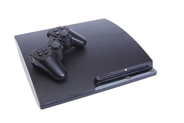 PlayStation 3 W/ 3 Games and 2 Controllers