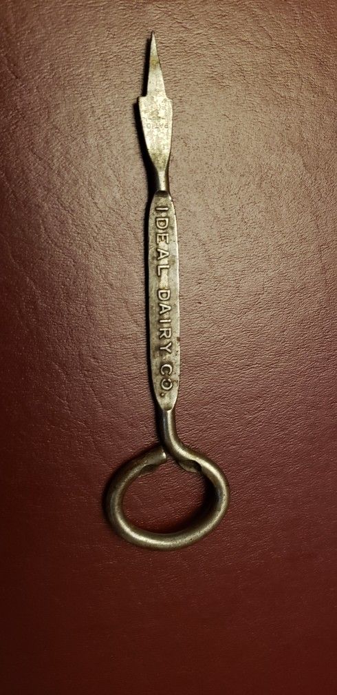 Antique IDEAL DAIRY CO. Bottle Opener