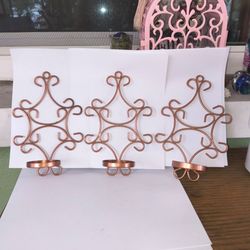 Beautiful copper-colored wire wall-hanging tea candle sconces