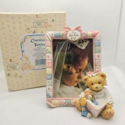 NEW  Cherished Teddies Communion Photo Frame Girl Reading Doll Prayer Religion 

MIN CONDITION,  STORED IN THE BOX, COMES WITH ORIGINAL PACKAGING

Gir