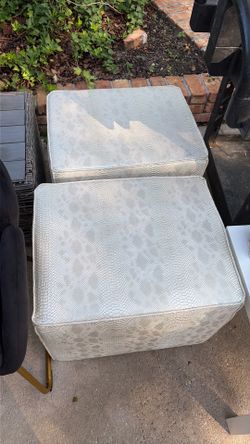 2 cream snake skinned cube chairs